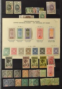 Stock mainly of African areas in 2 slipbooks, with lots of Senegal, Cameroon, Mali, very many stamps, vf/f/to be checked