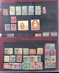 Composition très variée dans un classeur à anneaux, avec notamment de nombreux timbres fiscaux, territoires anglais, tb/b/à voir