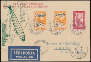 27.3.1931 N° 163Aa (Mi. Zeppelin Specialised), LZ 127 Hungarian Flight postcard sent to Barr, France and franked with two singles of the Hungarian 1p zeppelin stamp (Michel 478) + another 20f airmail stamp, all tied by Budapest c.d.s., most decorative and neatly struck zeppelin flight cachet alongside in dark green, as well as Friedrichshafen landing postmark and, relatively uncommon for many such cards addressed to European destinations, an arrival c.d.s. (dated 31.3), vf