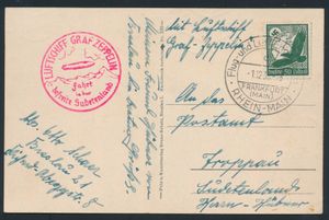 1.12.1938 N° 20 (Mi. Zeppelin Specialised), LZ 130 Sudetenlandfahrt ansichtkaart verzonden vanuit Frankfurt naar Troppau (tegenwoordig Opava, Tsjechië) en gefrankeerd met een 50pf luchtpostzegel (Michel 535) met speciale poststempel van Frankfurt, zeppelinvluchtstempel in karmijnrood, zm