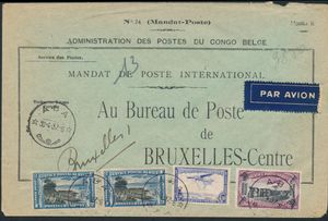 1937 PA 3 (2x) “2fr. blue,” PA 6 “30fr. lilac,” and PA 11 “4.50fr. oversea“ on a cover for an international postal money order sent from Aba on 4/30/37 to Brussels; since the item was postage-free, only the airmail fee was paid, i.e., ”38.50fr.
