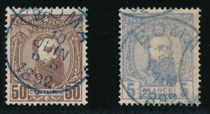 N° 9 “50c. reddish-brown” and 12 “5fr. gray,” cancelled “BOMA” in blue, both with full margins, very fine (OBP €249)