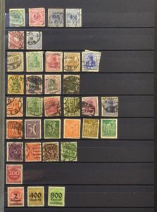 Diverse items in 11 albums/insteekboeken, w.o. België, zm/m/ntz