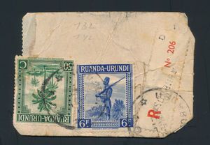 1945 Nos. 132 and 142, “5c. green” and “6fr. blue,” from the ‘Palmiers’ issue, on a parcel label sent by registered mail from Usumbura on 12/4/45; on the back, a green label from the parcel with a Belgian postage due stamp for “3.50fr.” Cancelled in Florenville, date illegible; Ruanda-Urundi parcel labels are rare, to be checked