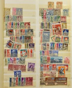 Diverse items in 15 insteekboeken, w.o. Zwitserland, Azië, zm/m/ntz