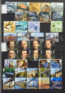 Verzameling met dubbels in 8 boeken, w.o. Alderney en Kanaaleilanden, zm