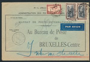 1937 PA 5 (2x) and PA 12 “15fr. sepia” and “5fr. brown-yellow” airmail stamps on a cover for an international postal money order sent from Stanleyville on March 20, 1937, to Brussels; since the item was postage-free, only the airmail charge of “35fr.” was paid, handwritten notation “50gr.” (charge in effect until March 31, 1937, of “3.50fr.” per 5gr.) on the back; cancellation “BRUXELLES 1N/27 1937”; rare item, very fine