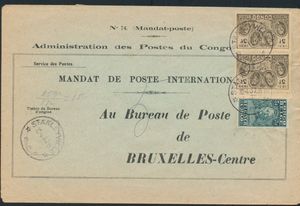 1937 N° 147 “5fr. green Stanley” and 191 (2x) “5fr. brown-black” 50th-anniversary stamp on a cover for an international postal money order sent from Stanleyville on 4/22/37 to Brussels; since the mailing was postage-free, only the airmail rate was paid, i.e., “15fr.” handwritten notation “25g./5p = 15” (charge effective April 1, 1937, of “3fr.” per 5gr.), rare item, very fine
