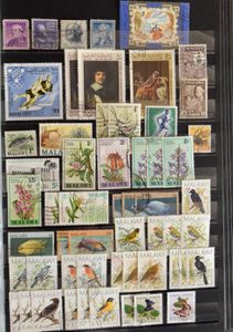 Thick stockbook full of all kinds of countries, mostly themed including Malaysia, Mexico, vf