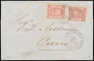 1869 N° 14 (S.G.), dubbel gefrankeerde omslag van Alexandrië naar Caïro met twee losse postzegels van 1 pi rood (uitgave 1867) verbonden door duidelijke afdrukken van het zogenaamde 