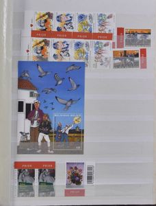 W.O. II tot eind jaren '90, restant handelaarsstock , vele zegels, weinig volledige reeksen, vele dubbels, in 4 boeken, zm/m