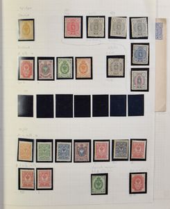 1889/1975 Verzameling in album vanaf wapens met o.a. postwaardestukken, boekjes, zm/m