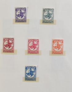1859/1975 Verzameling in album met o.a. Caritas postfris, Europa CEPT **, zm/ntz