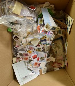 Thousands of stamps in bags, mostly on fragments, various countries, to be checked