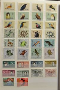 Various items in 8 books and on loose sheets, including Poland, music theme, Belgium, vf/f/to be checked