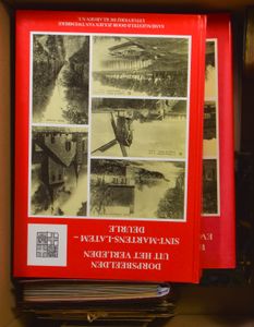 LITERATURE: Various items, including village and city scenes, 3 catalogues, etc. (9 books)