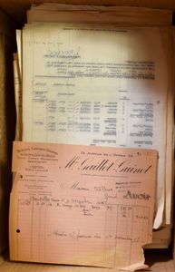 INVOICES: Box with old invoices, many with tax stamps, cancelled, mainly knitwear, f/to be checked